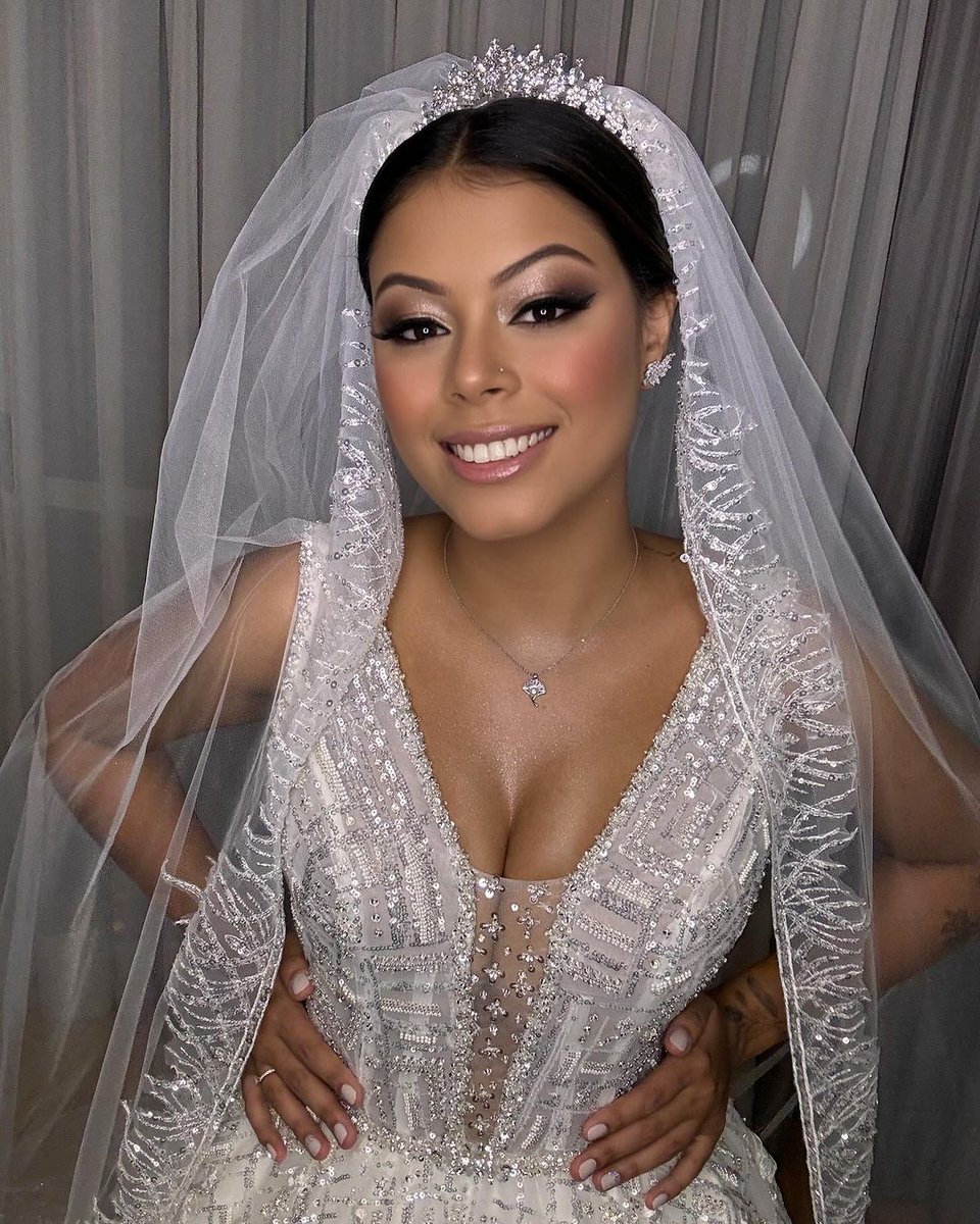 We love this glam look by our gorgeous bride Thifany! She is wearing our Forever gown that shines bright with beautiful beading. Share this with a #bridetobe for inspiration. 

#wedding #bridalwear #weddingmakeup #weddingdress #weddinghairstyles #bridalmakeup