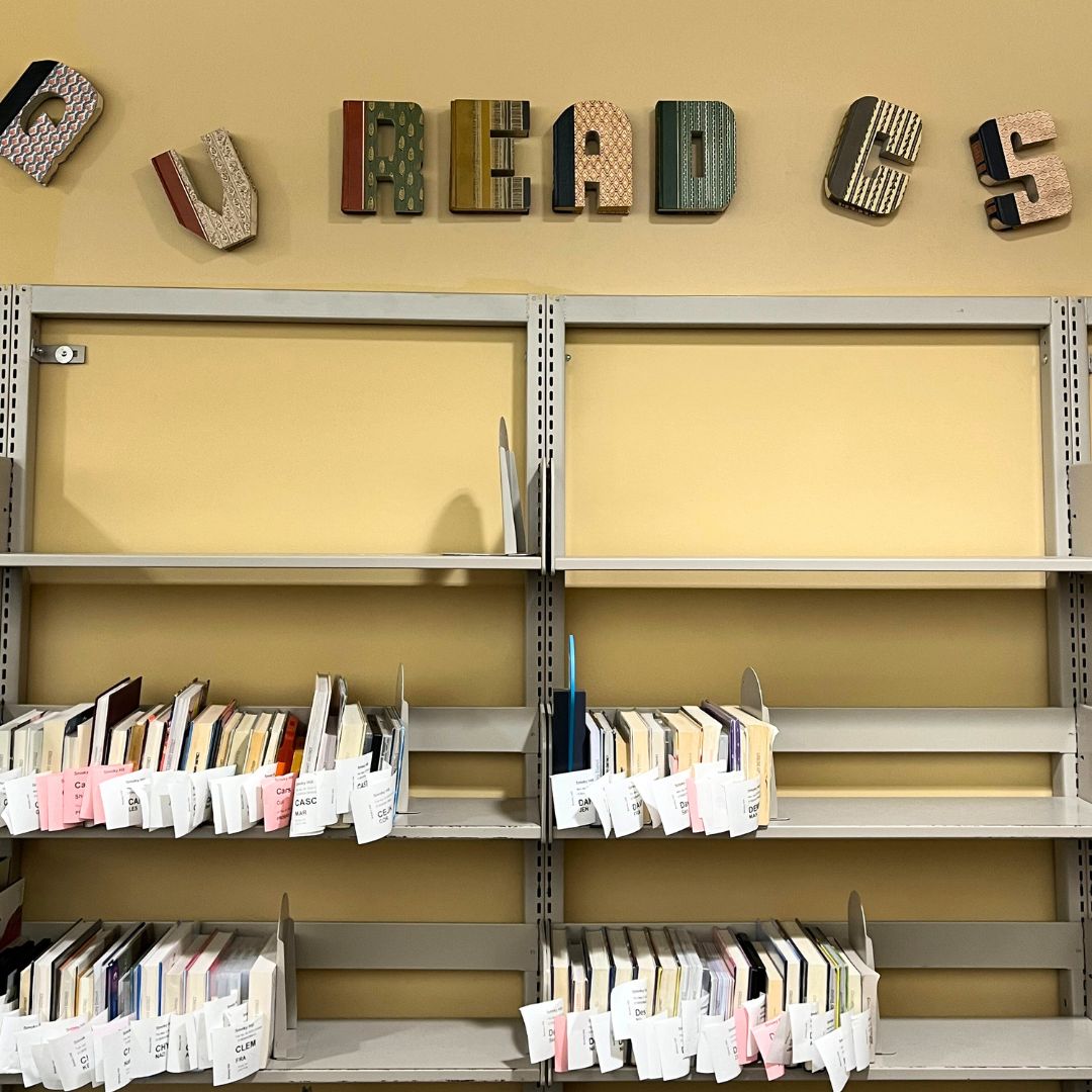 📚✨ Step into our cozy library and let your eyes wander over the stunning book art adorning our walls, like this holds shelf at Smoky Hill Library. Which book is on hold for you? Let us know below! #BookArt #LibraryLove
