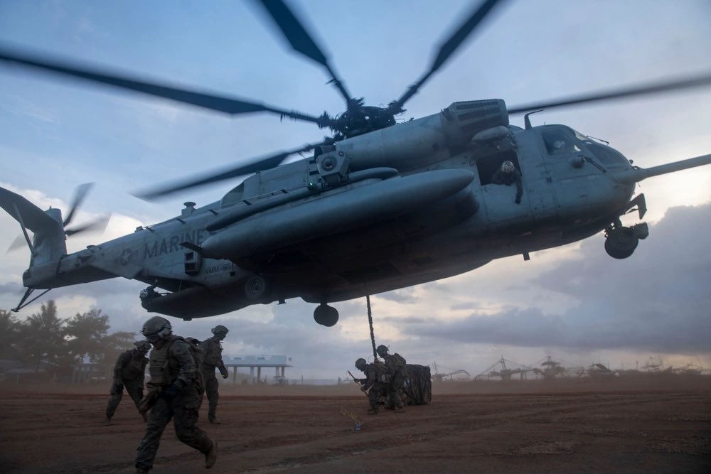 3rdmaw's tweet photo. Heavy Lifting in the Philippines💪🇵🇭

#Marines assigned to CLB 15, and Marines and CH-53E Super Stallion helicopters assigned to VMM-165 (Rein.), @15thMEUOfficial , conduct external lifts #ExerciseBalikatan 24 at Tarumpitao Point, Palawan, Philippines, May 2, 2024. https://t.co/Jp6rCiiQ36