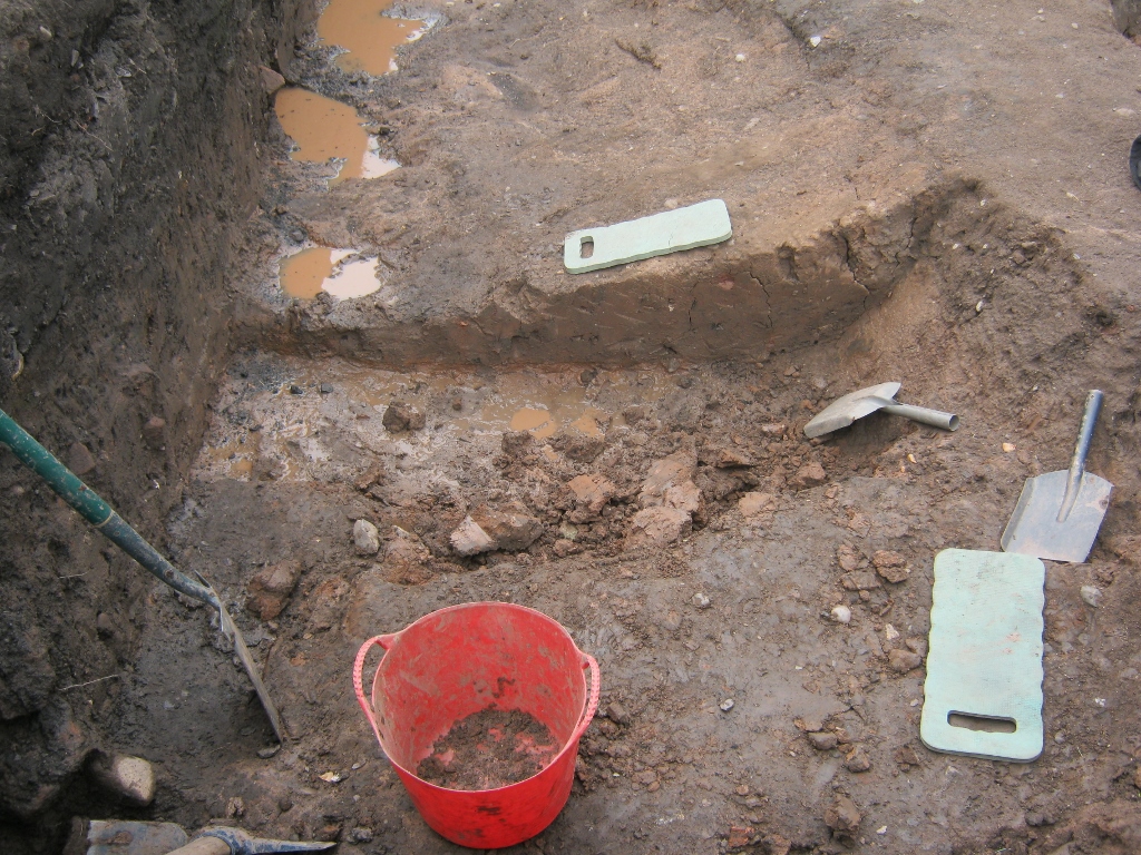 Day 15 - water, water everywhere. The feature on the south edge of the site has a very thick clay lining, it must have been important that it was water tight. Another well-constructed drain has been found cutting the gutter-like drain in the north-west corner! @HistArchChester