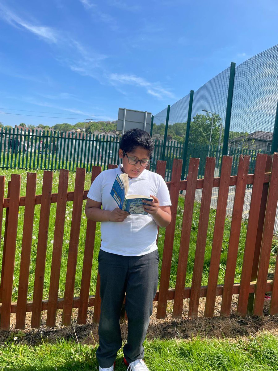 What a perfect day for reading in the sun! ☀️ Members of our lunchtime library club chose to read outside today! Great idea Mrs Atkinson! @HighCragsPLA