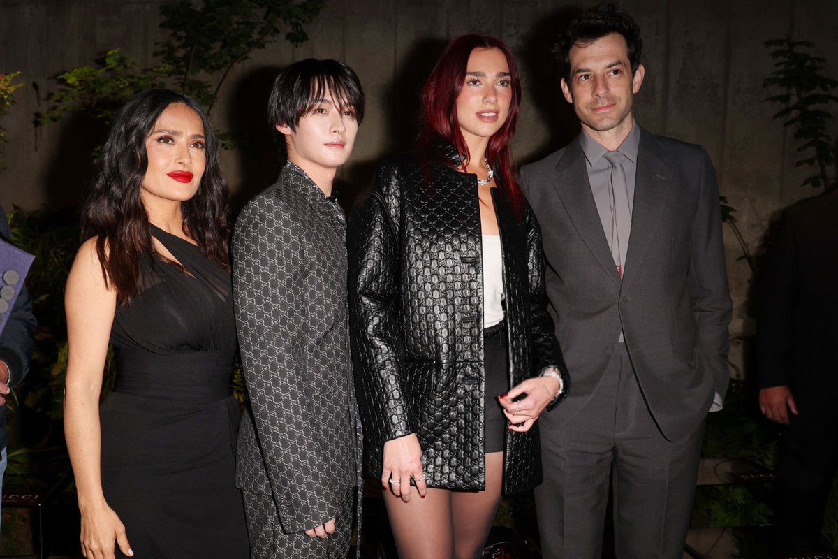 Dua Lipa with Lee Know from @Stray_Kids, Salma Hayek and Mark Ronson at the Gucci Cruise Fashion Show in London today!