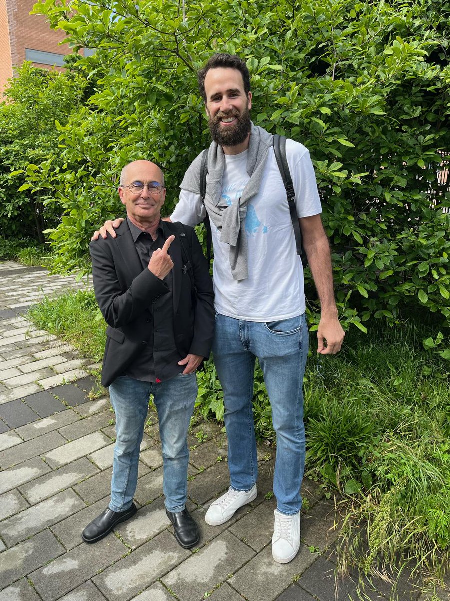 This is me and basketball legend and great man @GigiDatome. Somehow the angle of this photo was off and Gigi incorrectly looks much taller than me. In reality I am much taller than Gigi. I share with you privately that I also beat Gigi in a dunk contest before this was taken.