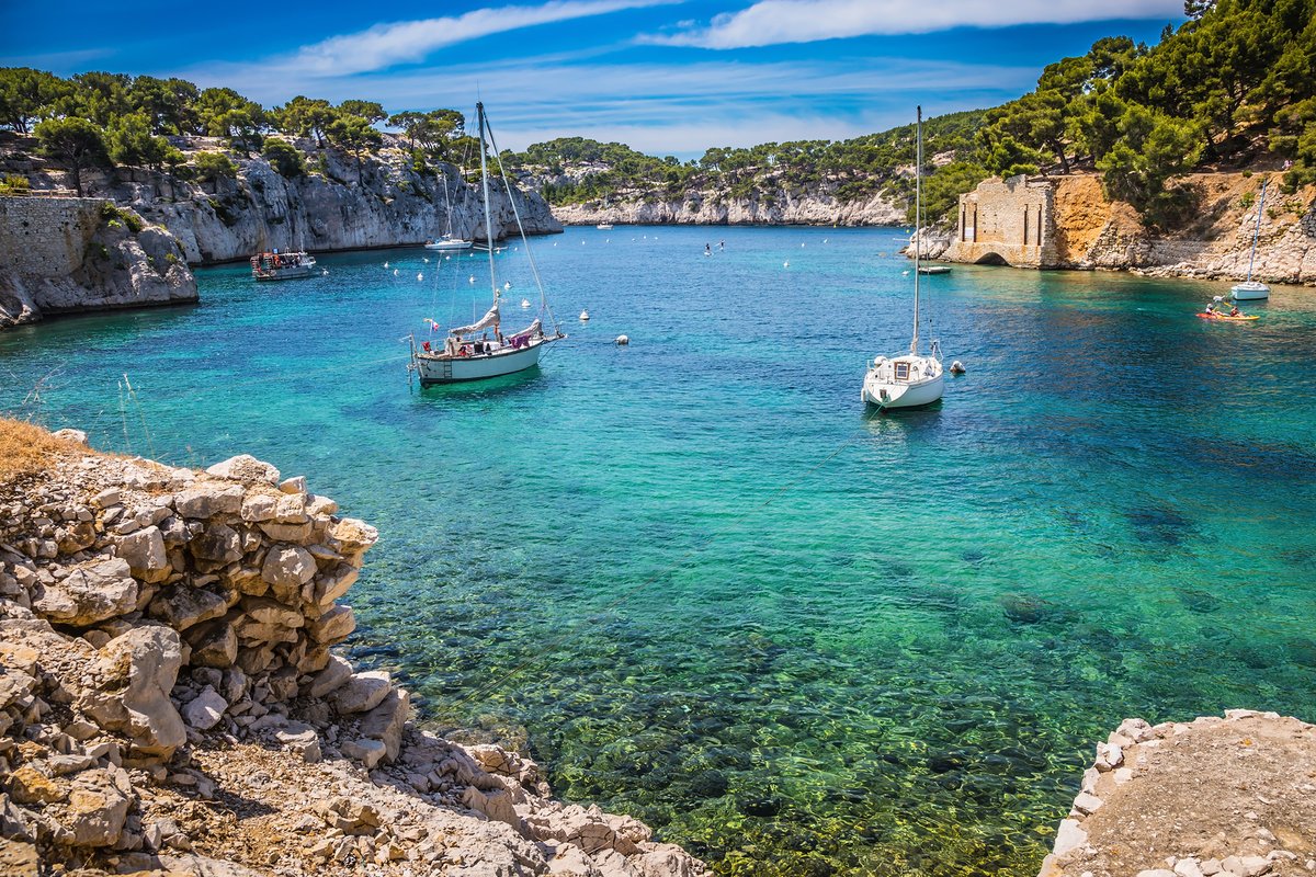 Dive into the beauty of Calanques National Park in the Provence region of #France From rugged cliffs to turquoise waters, it'll prove to be an unforgettable vacation. Or is there another region of France you’d like to explore? Call the #jbltravelgroup today!