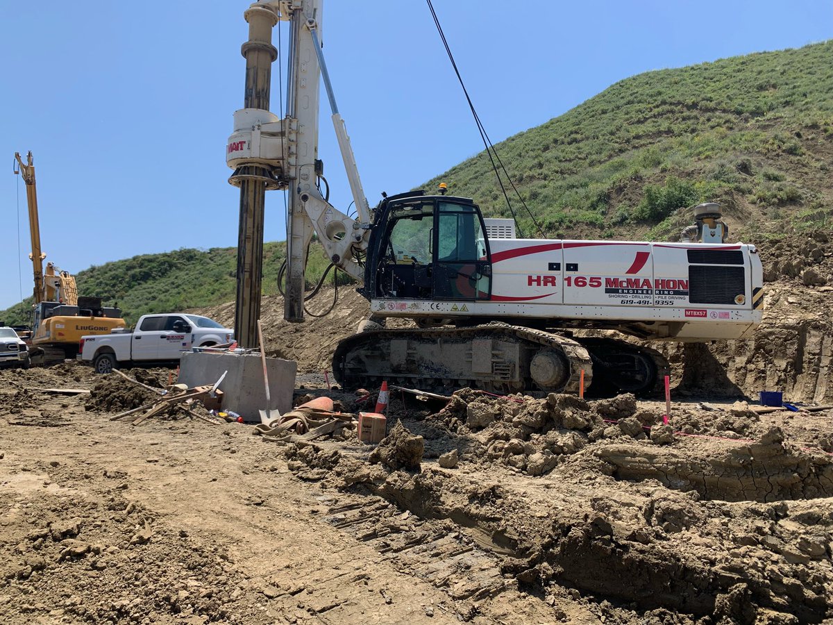 🚧SR 150 SLIDE UPDATE🚧 Crews have been making progress drilling holes for the 45 piles (ranging from 65-75 ft.) that make up the retaining wall. So far workers drilled, set beams in place, and poured concrete at 13 locations. SR 150 remains CLOSED btwn Stonegate Rd & Mupu Rd.