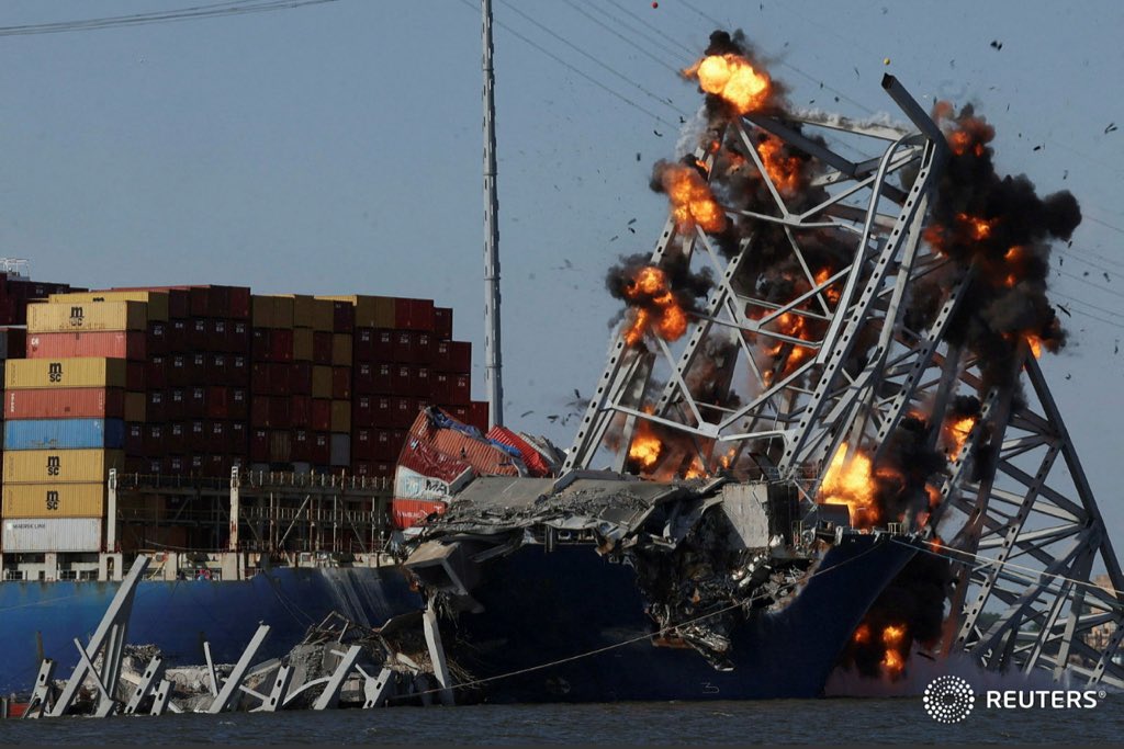 Explosives are detonated to free the container ship Dali, after it was trapped following its collision with the Francis Scott Key Bridge, causing it to collapse, in Baltimore, Maryland, U.S. May 13, 2024. REUTERS/Leah Millis