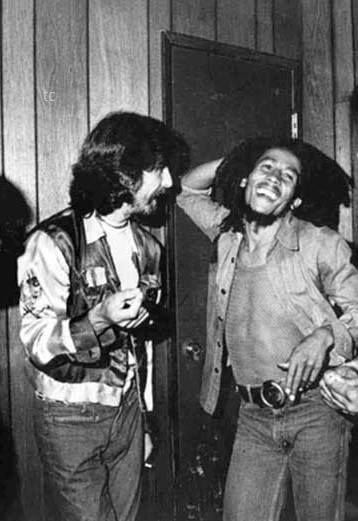 George Harrison and Bob Marley smoking blunts backstage, 1975