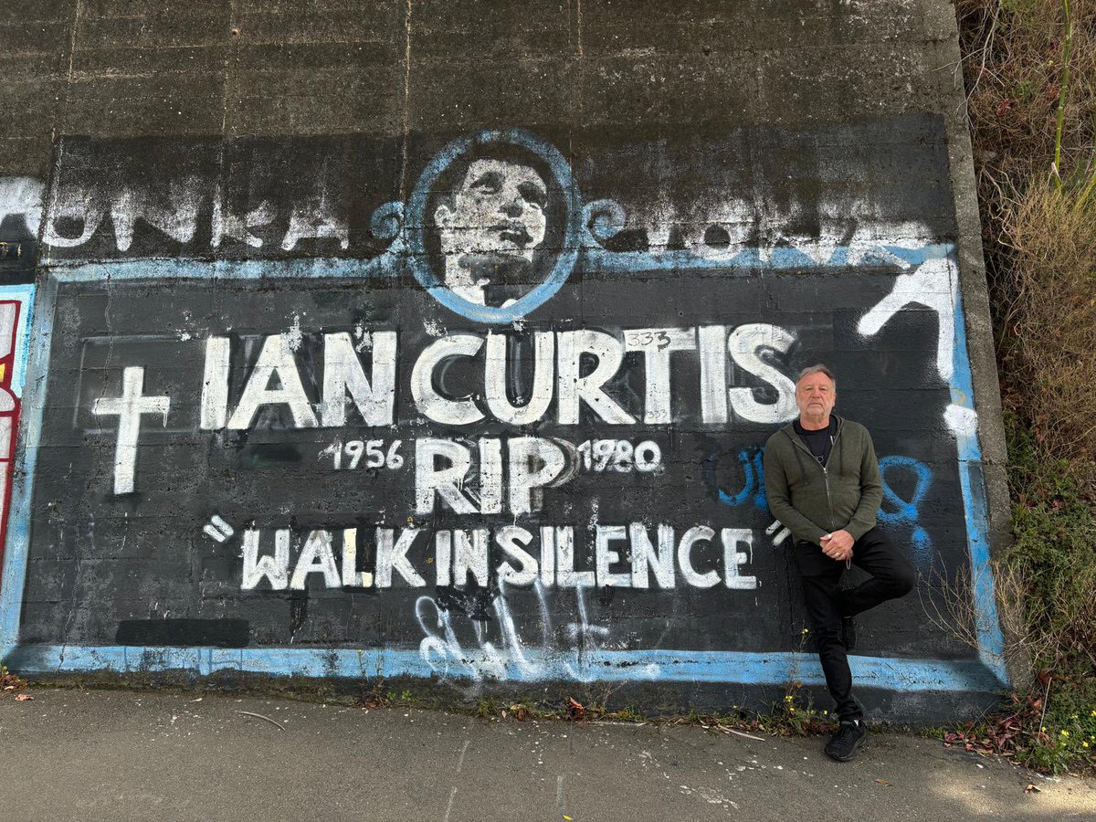 Made it to New Zealand! First stop had to be the Ian Curtis Memorial Wall here in Wellington. First painted in 1981 it was removed by the council but the guy kept putting it back up! So it became permanent… Australia/NZ tour starts here this Thursday! peterhookandthelight.live