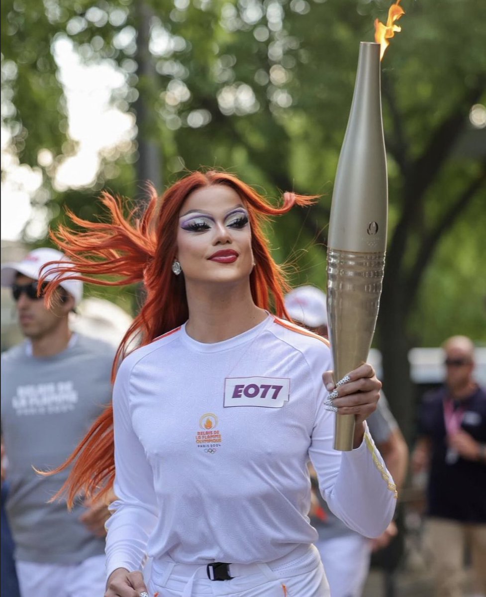 Nicky Doll looks beautiful while carrying the Olympic Torch for the 2024 Olympic Games in Paris, France.