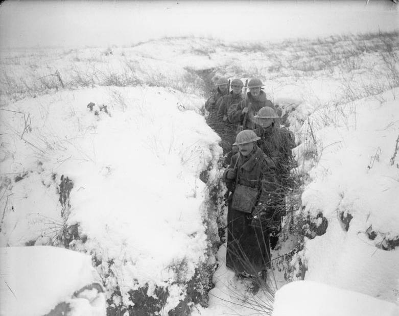 British soldiers coming out of a snowy communication trench near Arras, February 1917