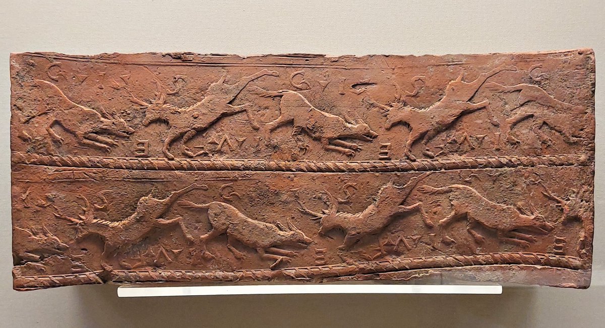 #TilesOnTuesday #TerracottaTuesday Lively #Roman box flue tile w roller-applied hunting scene+random letters. Curious, as flue tiles embedded in walls to distribute heat and never seen again, but texture = better keying for mortar. @britishmuseum from ?villa, Ashtead Surrey