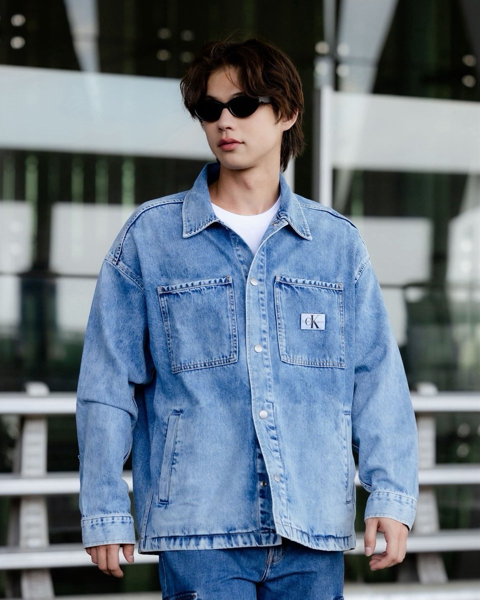 Thai heartthrob @bbrightvc is spotted at Suvarnabhumi Airport, Thailand, in one of his personal favourite @CalvinKlein looks — the Recycled Cotton Oversized Denim Shirt, Monogram Tee & 90s Loose Cargo 👖😎 #BrightVachirawit #ไบร์ท #ไบร์ทวชิรวิชญ์ #CalvinKleinXBright #CalvinKlein