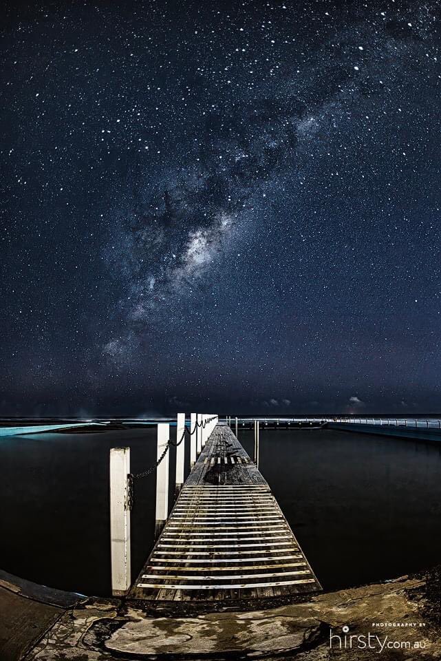 Last night was perfect for Milky Way viewing in Sydney. No moonlight, no wind, no cloud and the Milky Way rising straight over the walkway at Narrabeen beach pool. (Hirsty)