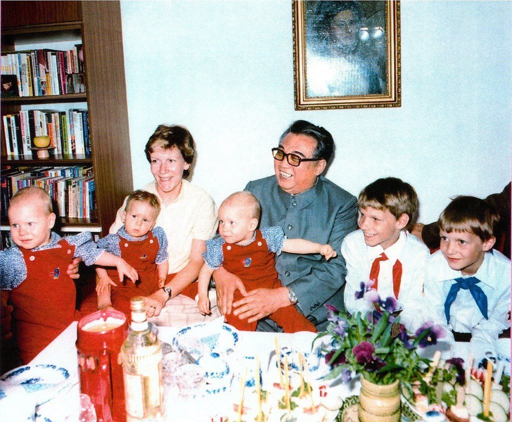 President of North Korea Kim Il Sung meets a German family during his visit to GDR, 1984