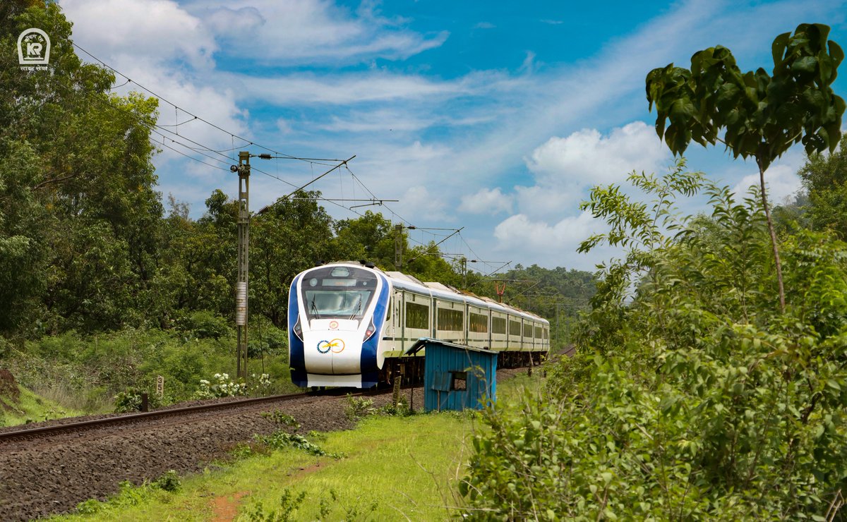 Gliding through lush greenery, Vande Bharat Express makes its scenic journey between Zarap & Sawantwadi Road Railway Station. #IndianRailways @RailMinIndia