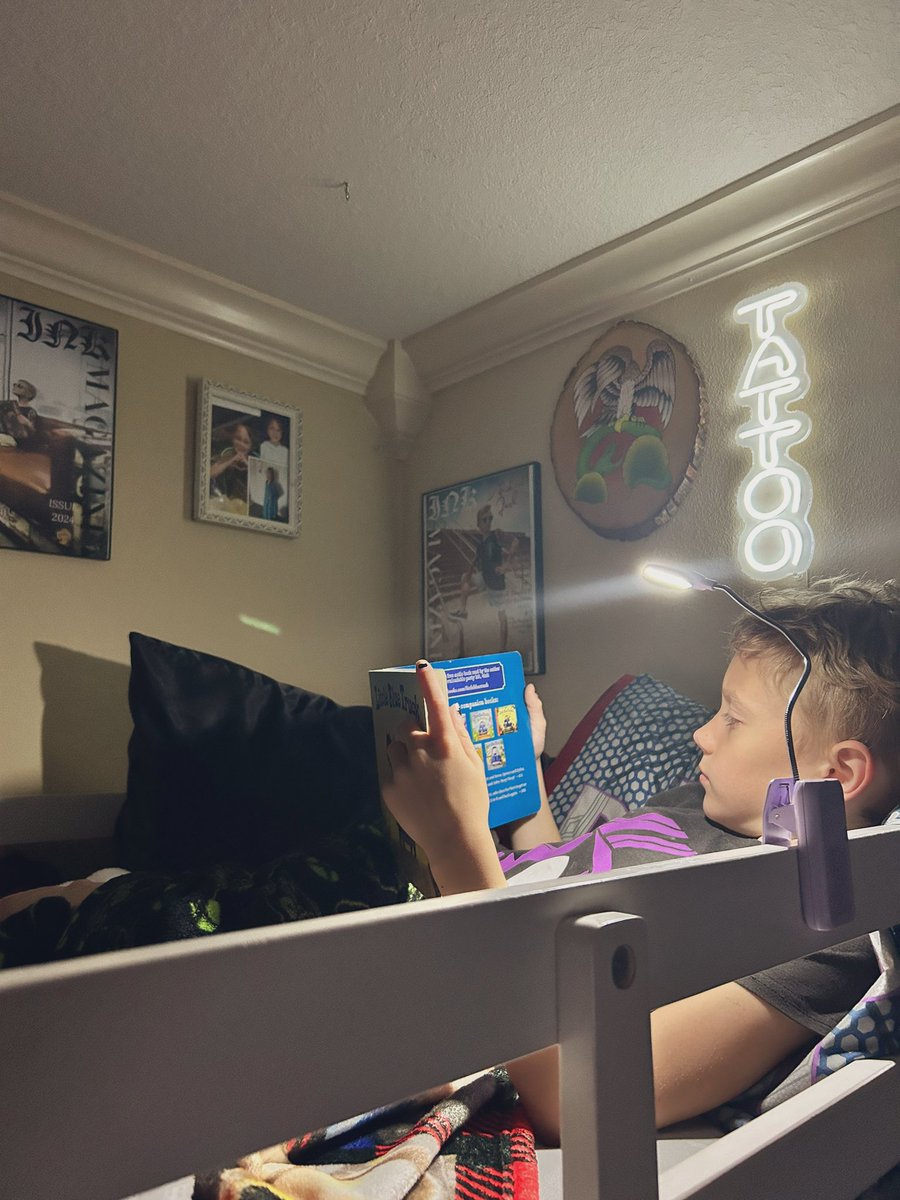Aiden has been struggling with losing a close friend. It’s been really hard on him… he hasn’t slept well since… tonight I could hear a soft voice coming from the boys room… it was Aiden with a stack of books reading to himself. His great grandma got him a bed light that he’s