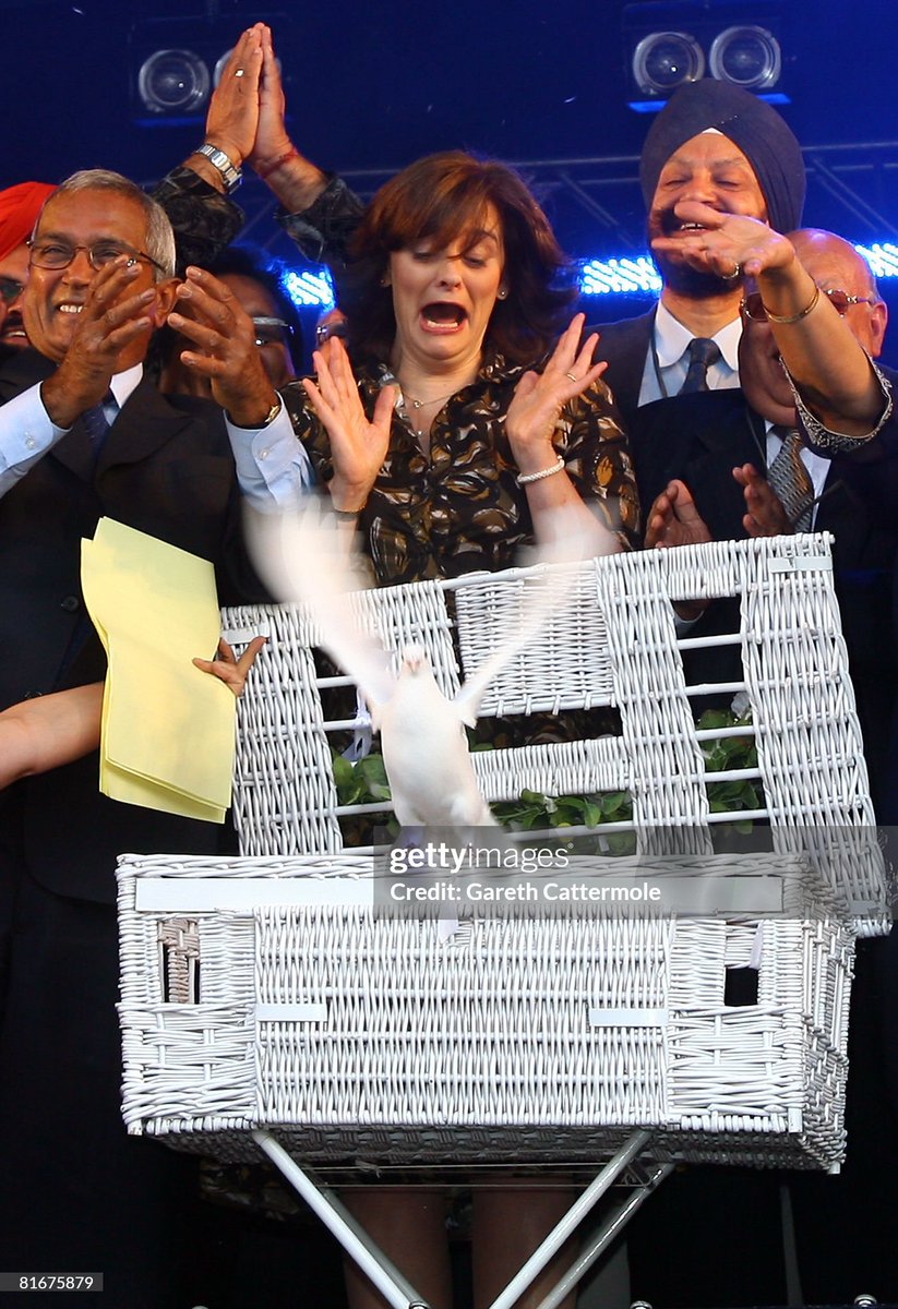 President of The Loomba Trust Cherie Blair releases doves into the air at the International Widows Day Concert held in Trafalgar Square (2008)