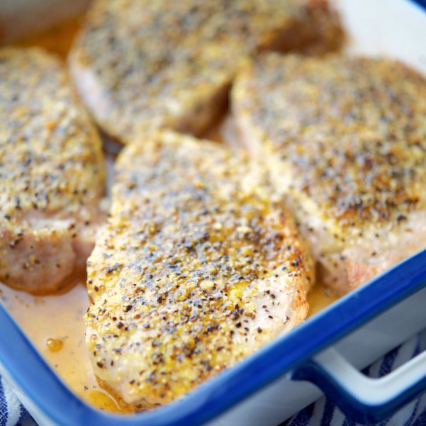 Boneless center cut pork chops topped with lemon pepper seasoning; then oven baked make a tasty gluten free, dairy free and low carb meal. RECIPE--> carriesexperimentalkitchen.com/lemon-pepper-o…