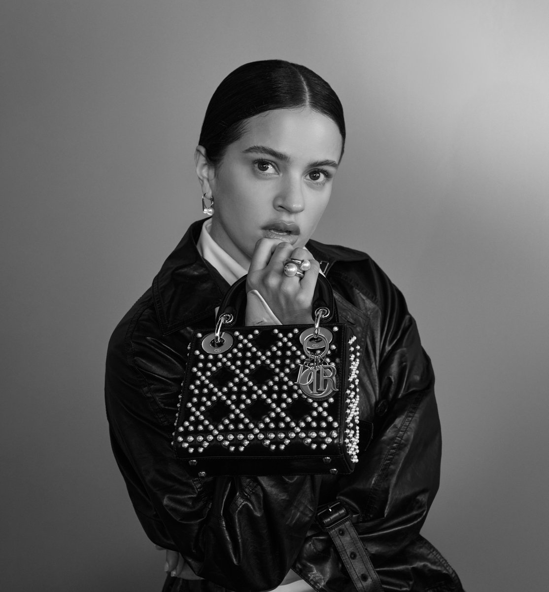 Monochrome unveiling. Celebrating the synergy between fashion and music, the House is delighted to announce the multitalented singer @Rosalia as the new Dior Ambassador. Captured by Collier Schorr, her singular essence illuminate Maria Grazia Chiuri's timeless creations.