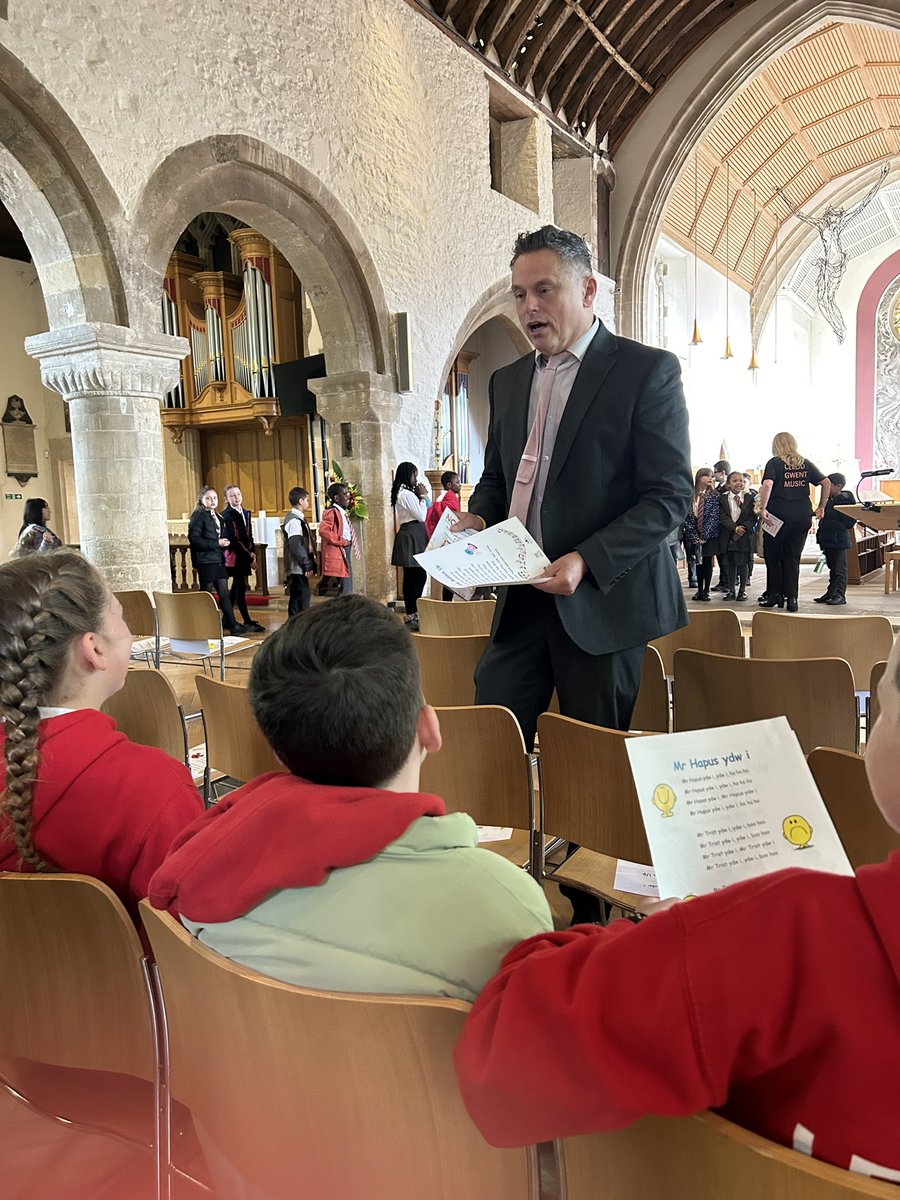 PPSMrsSymes's tweet image. The year 6 CROESO team and Rose have arrived at St Woolos Cathedral to join with other children’s services across Newport. Rose will be reading her poem - The Magic Box to a packed cathedral. @PentrepoethPrim