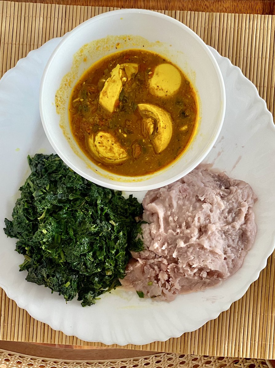 From farm to fork. Pumpkin leaves (seveve) and Malabar spinach (nderema) cooked in spring onions and ghee, served with mashed arrowroot (nduma) in butter alongside an egg curry. #localfoods