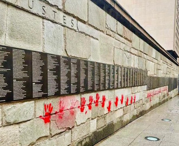 Holocaust Memorial DESECRATED with red hand prints in Paris. The Shoah Memorial, which pays tribute to the 6 million Jews who lost their lives during the Holocaust, has been targeted by antisemitic activists who covered the Wall of the Righteous in blood red hand prints.