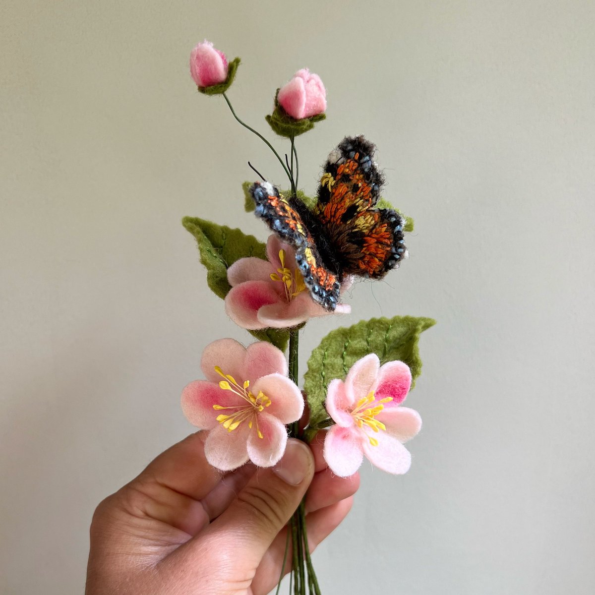 I am creating another Spring wreath which I am making the elements for at present. Here is a quick peek at the felt apple blossom & the small #Tortoiseshellbutterfly that will be part of this next wreath #woolfelt #handmade #choosewool #springmakes #campaignforwool #madeinBath