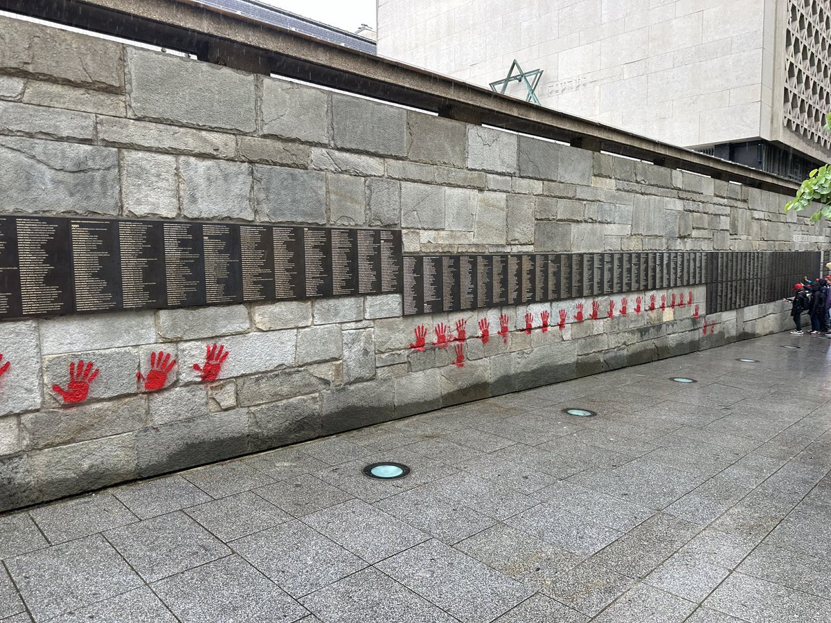 Utterly disgusting. A Holocaust memorial in Paris was vandalized with blood-red handprints. For the people who did this, 6 million dead Jews wasn't enough.
