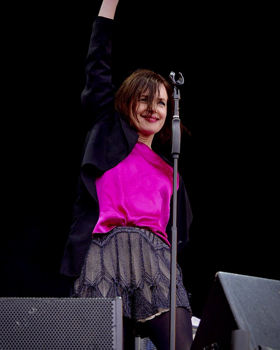 elizabeth mcgovern onstage performing with big country at the isle of wight festival (june 2012) 📸: jonathan hordle