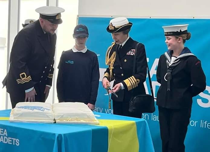 Princess Anne as Admiral of the Sea Cadet Corps, Marine Society and Sea Cadets, cutting a cake at Stonehaven and District New Headquarters, yesterday!