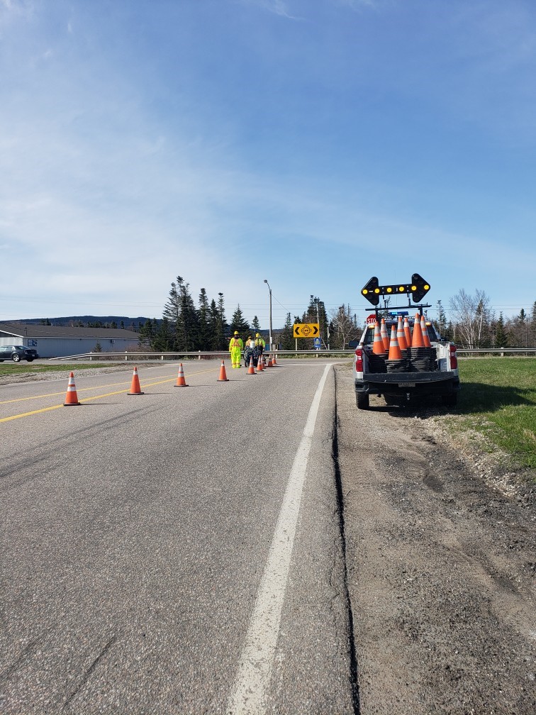 🌞Sunny day for the @TI_GovNL pavement marking crew to complete work on the TCH and Route 430 Interchange. Please slow your vehicle and respect traffic control measures if you are driving in the area. #nltraffic #GovNL