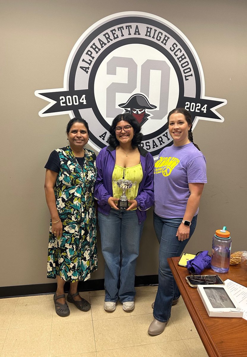 This morning at School Governance Council (SGC) we recognized Rini Bokil as the 2024 recipient of the AHS FACULTY CUP! 🏆. Rini has served SGC and the AHS community as a student leader throughout her tenure at Raider Nation and is a model RICH Raider! Congratulations Rini!
