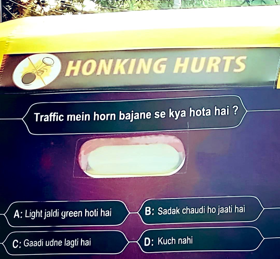 And this is how you drill sense in people around you. This sticker should be available to the rest of us too. Here the translation: Que. What happens by honking at the traffic signal? A) Signal turns green sooner B) Road widens on its own C) Vehicle starts to fly D) Nothing