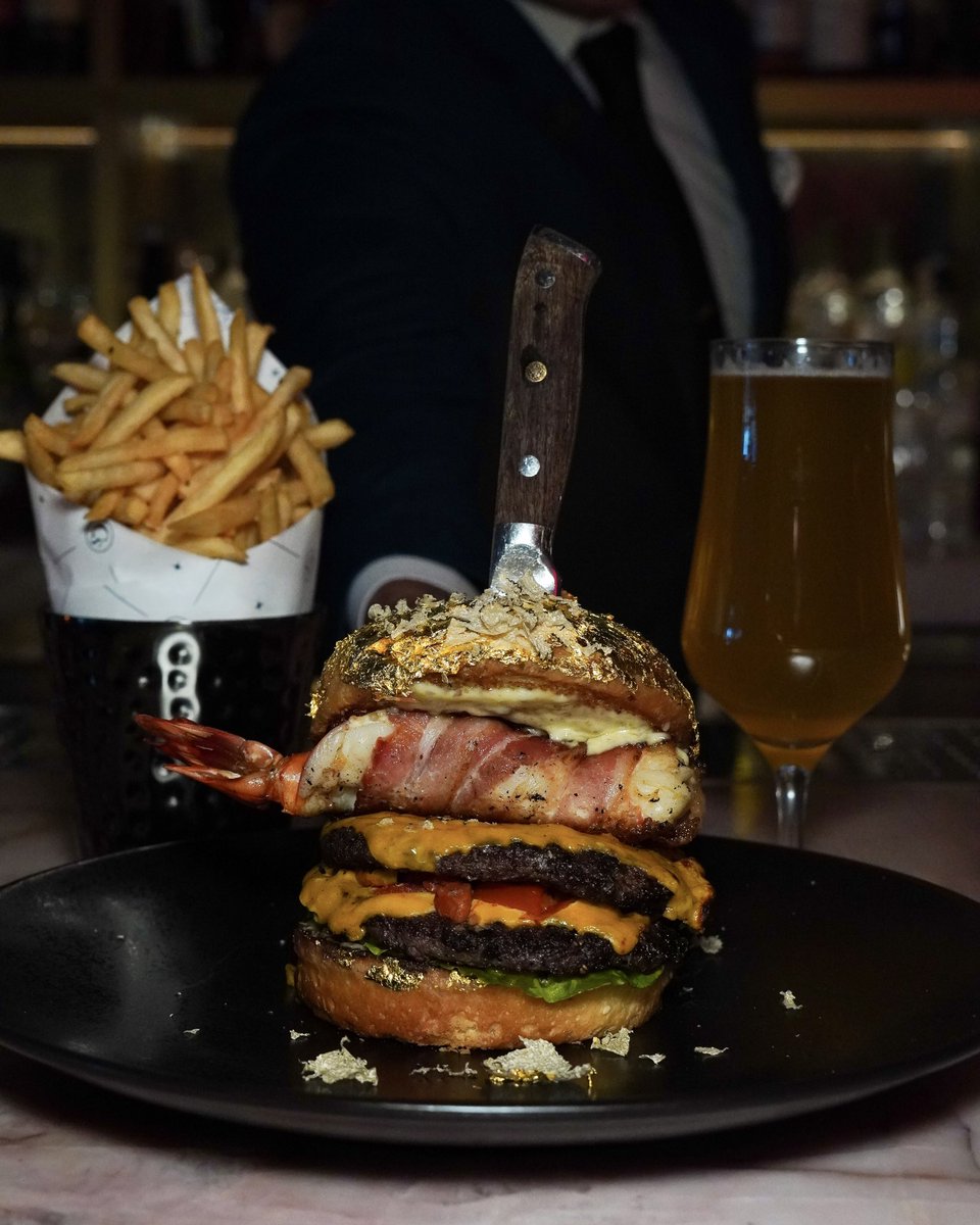 Look what’s dropping at #Carversteak exclusively for #NationalBurgerDay on May 28th. Indulge in our off-menu masterpiece: double Creekstone Farms American Wagyu patty, bacon-wrapped prawn and fresh truffle aioli all nestled between a gold leaf brioche bun.