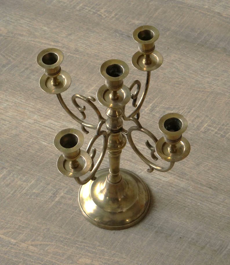 Vintage foldable brass candlestick, candelabra centerpiece,  baroque #candleholder #candles #candelabra mood lighting #homedecor #vintage #decor #HomeStyle #DecorateWithArt #elevateYourDecor #brass
Available here
 elementsdeco.etsy.com/listing/152589…