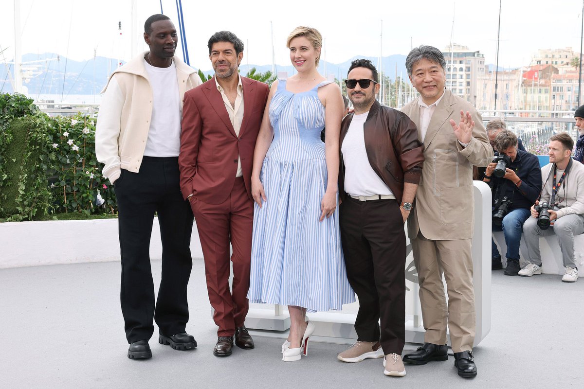 Hirokazu Kore-eda, Juan Antonio Bayona, Greta Gerwig, Pierfrancesco Favino  and Omar Sy at the jury photocall at the 77th annual Cannes Film Festival, image size:1199x800