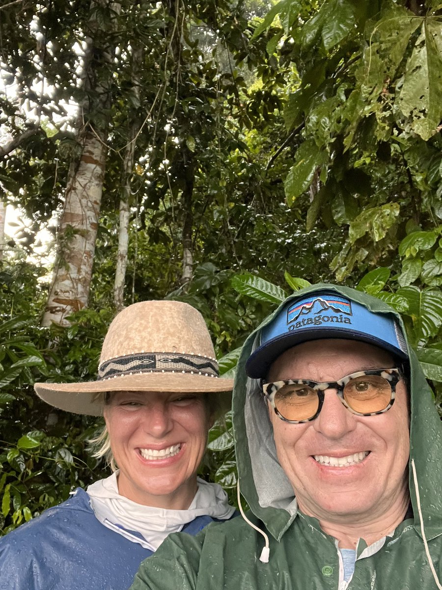 Yesterday, we did a rainforest jungle walk in pouring rain and it was *incredible* Our guide (in red up front) is a jungle master - showed us boa constrictor on a tree limb, nocturnal monkeys, found a tarantula spider, etc.