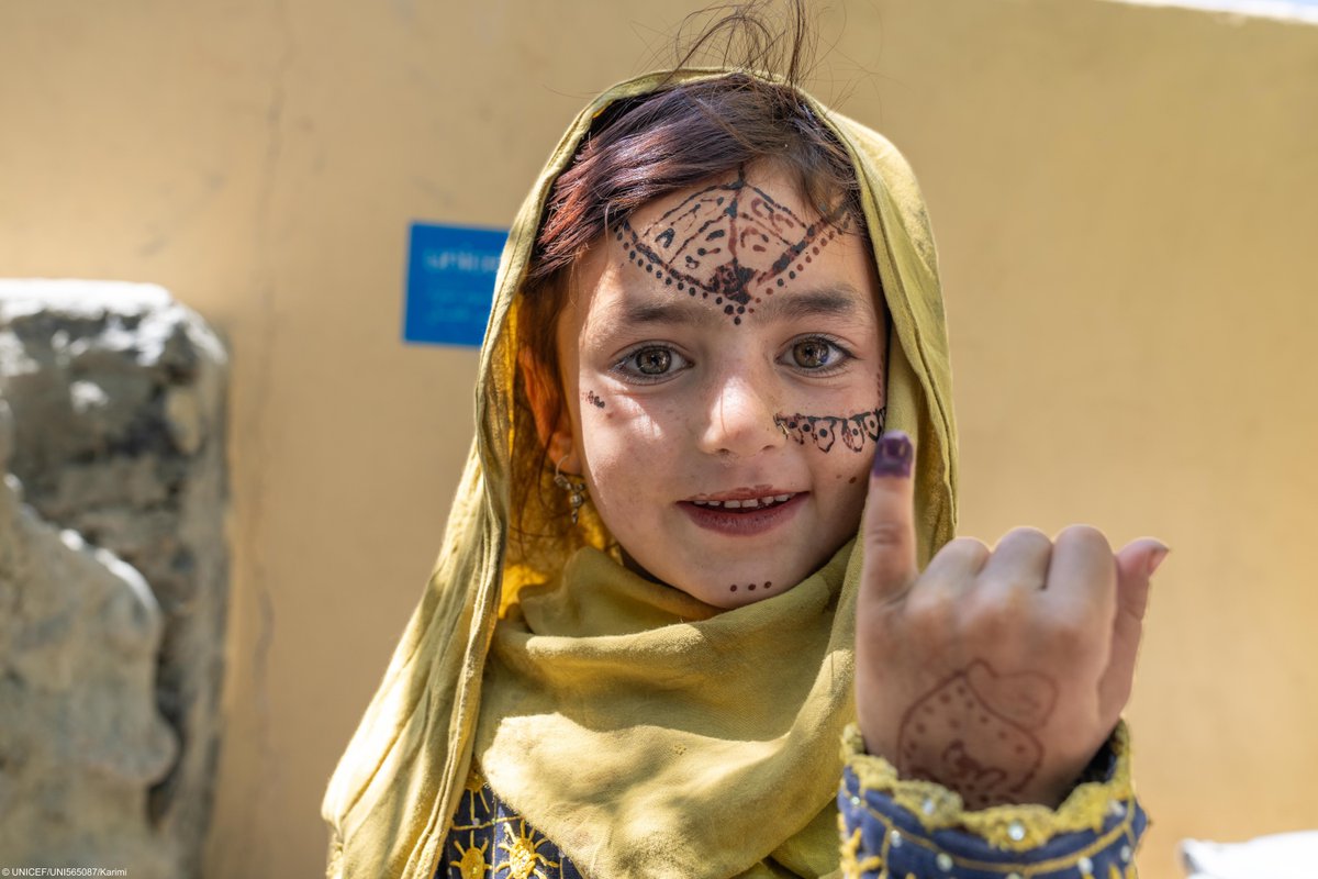 A girl in Khost province, #Afghanistan, happily shows her marked finger after receiving her #polio vaccinations. The Female Mobiliser Vaccinators have been instrumental in reducing the number of children missing their vaccination in the region, ensuring no child is left behind.