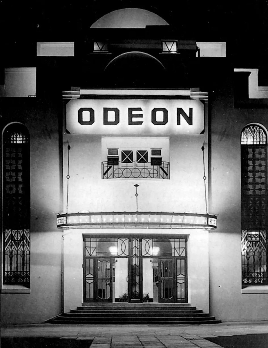 ODEON CINEMA In 1930 Oscar Deutsch opened the world's first Odeon cinema in Perry Barr , Birmingham. ODEON stands for Oscar Deutsch Entertains Our Nation