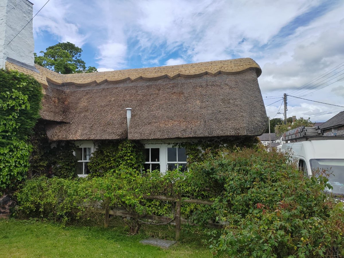 We’ve just re-ridged this listed cottage in #OldColwyn #NorthWales. The roof shape above the front door is reminiscent of roofs we have thatched in #NorthernIreland. #Thatching. #MasterThatchers.
