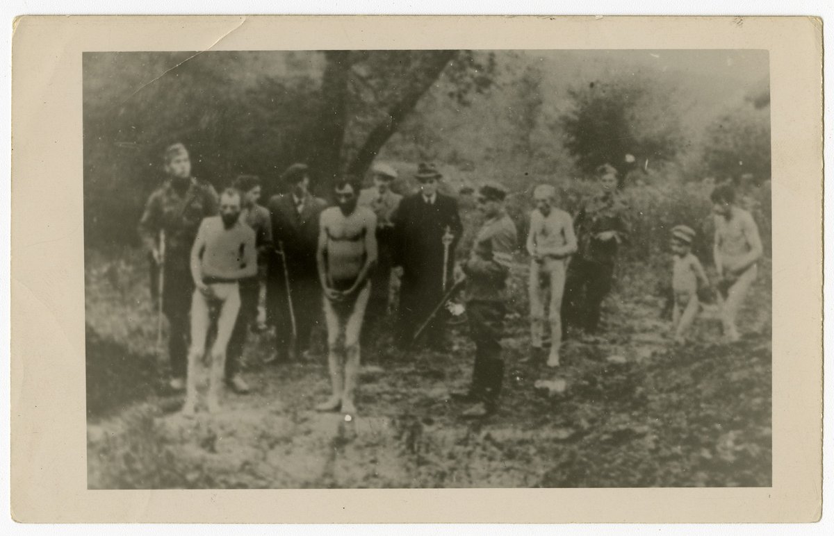 This picture is from the town of Sniatyn in Ivano-Frankivsk Oblast , Ukraine. It was taken on May 11 , 1943. You can see the Einsatzgruppen and Ukrainian Nationalists in fedora hats and long coats behind these naked Jewish men and boys standing at the edge of a ditch about to…