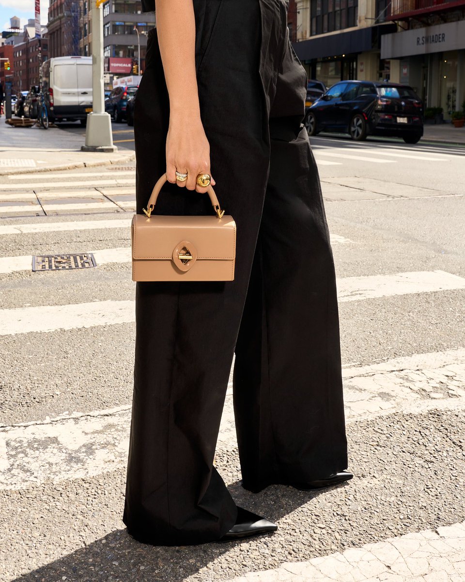 Summer is approaching and I’m taking a minimalist approach. Mini bags that are chic and fit just the essentials are my current vibe. What are your thoughts on mini bags? #summerfashion #trending2024