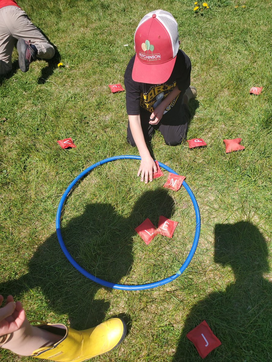 I can show ten in 2 parts! How many are in the hoop? How many are out? #math #outdoorlearning #seewhatiamlearning @SMES01 @nsaskproject