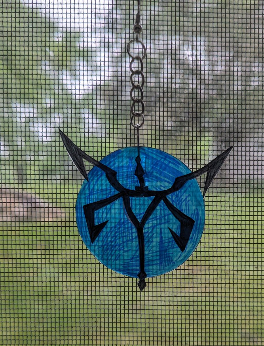 Yesterday I made a thing for my window. It's out of shrinky dinks so it got warped but it's supposed to be a blue medallion.
#REBHFun