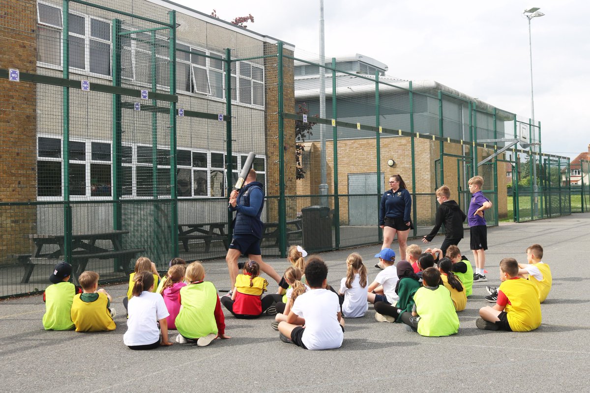 KennetSchool's tweet photo. Today's #ConnectWithKennet PE Masterclass is taking place on our courts. After watching a demonstration, Year 5 pupils split into groups, honing their cricket skills - bowling, batting and fielding - all whilst making new friends! #KennetPE https://t.co/9QYQD7WyBu