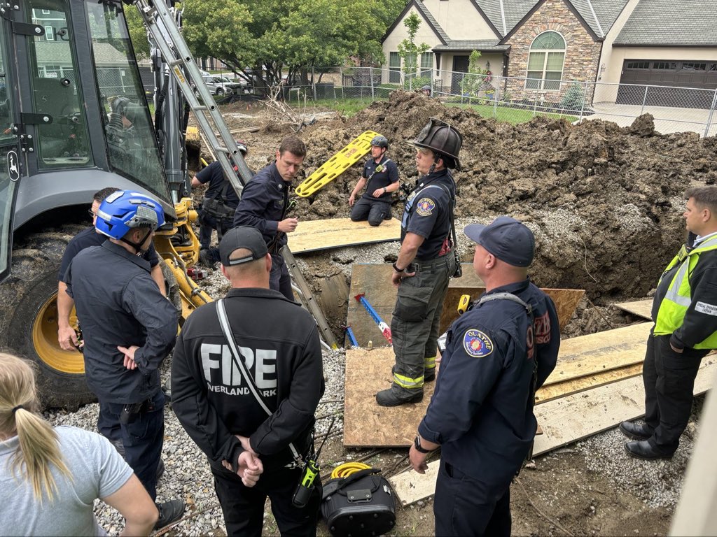 OPFD on scene 138th and Goodman trench collapse. One adult male in trench. Conscious and alert. Crews working to free him. More information later.