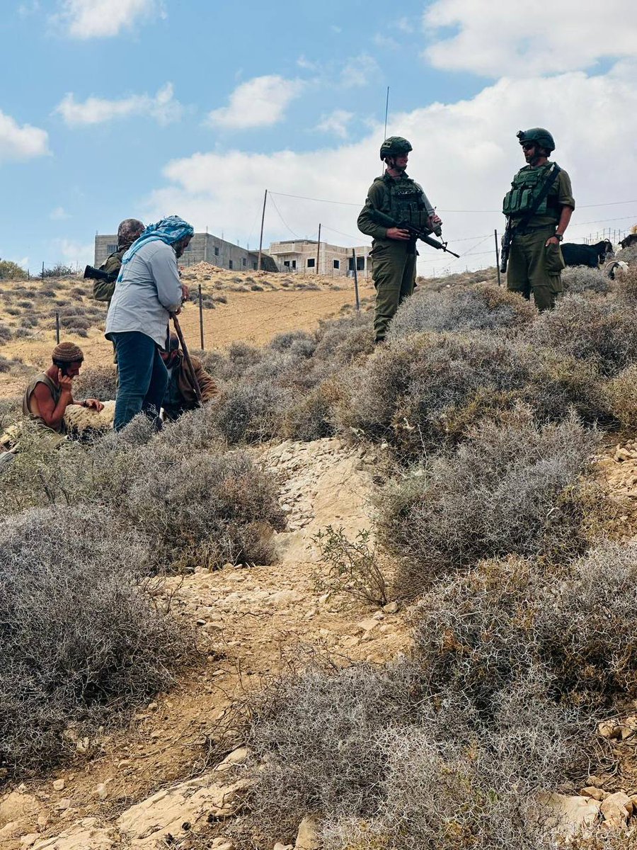 Under the protection of Israeli forces, Zionist settlers raided Palestinian lands in the village of Masafer Bani Na'im in Al Khalil, and stole sheep belonging to Palestinian farmers.