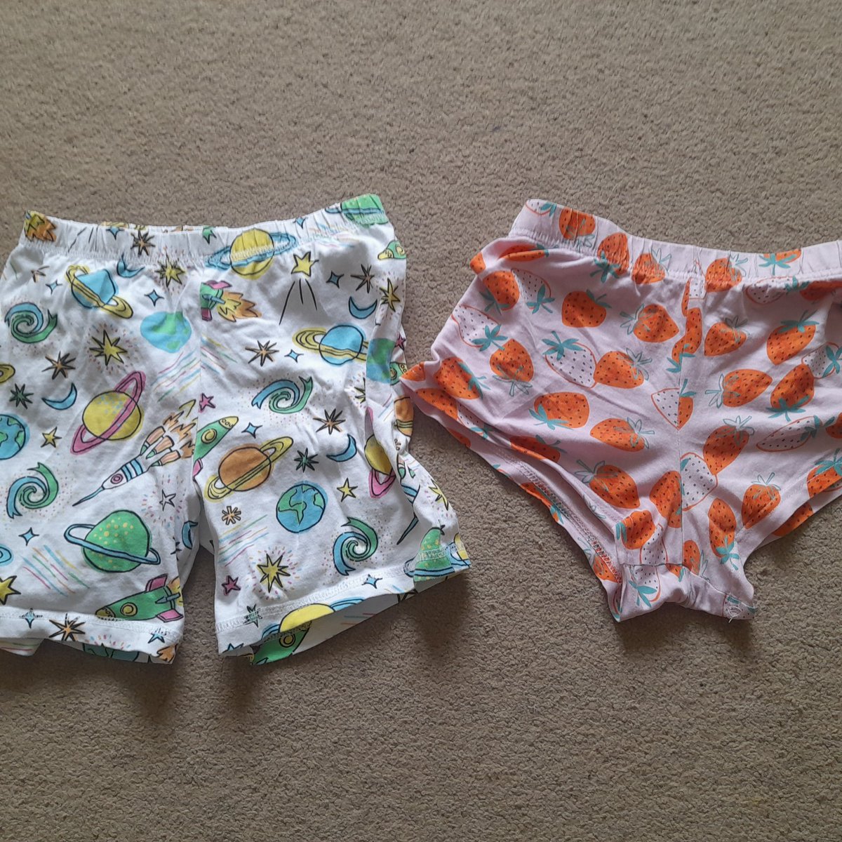 Spot the difference. 2 pyjama shorts. One from the boys side and one from the girls side of the same store. Yes they are the same size.