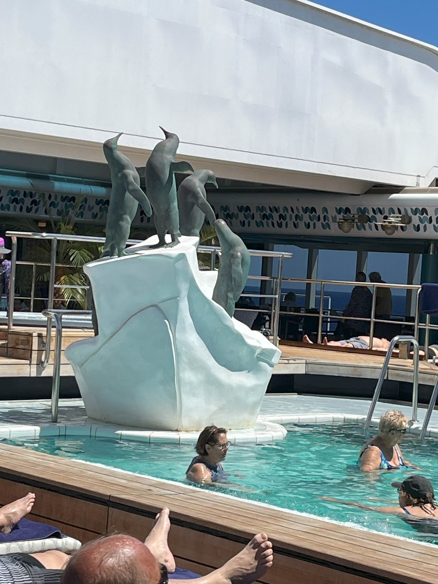 Pic of the day! (Taken Apr 2024) - a neat sculpture in the main pool of the Oosterdam. (The pool has a canopy so it can be closed overhead and the pool remains open. #authoronvacation #HollandAmerica #pooldecor