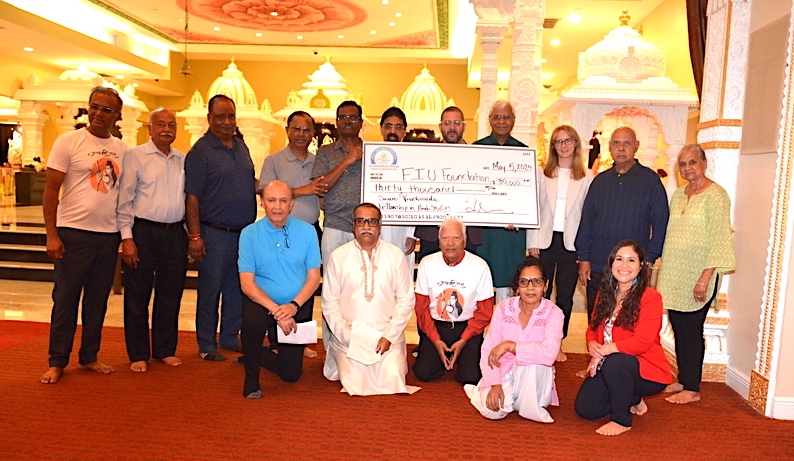 A signing ceremony and celebration were recently held at the South Florida Hindu Temple to mark the establishment of the Swami Vivekananda Fellowship in Hindu Studies in the Department of Religious Studies at the Steven J. Green School of International & Public Affairs. The